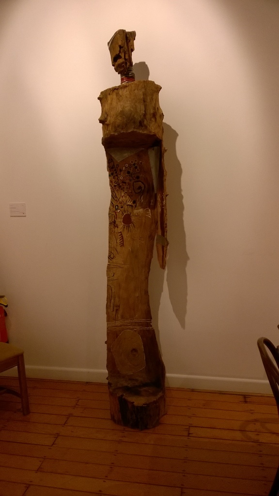 Adinsibuli Stood Tall, 1995, Tropical hardwoods, pigment and metal, 239x40x37 cm.